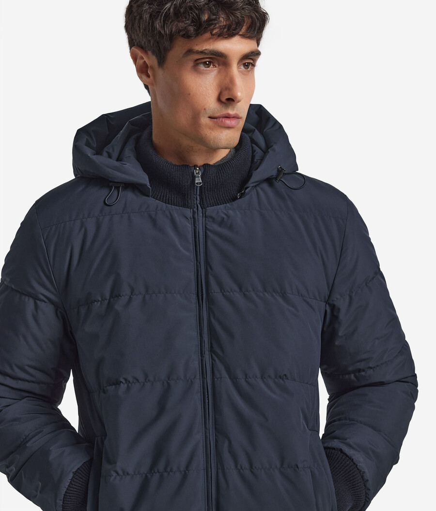 piumino reversibile con punto treccia in cashmere