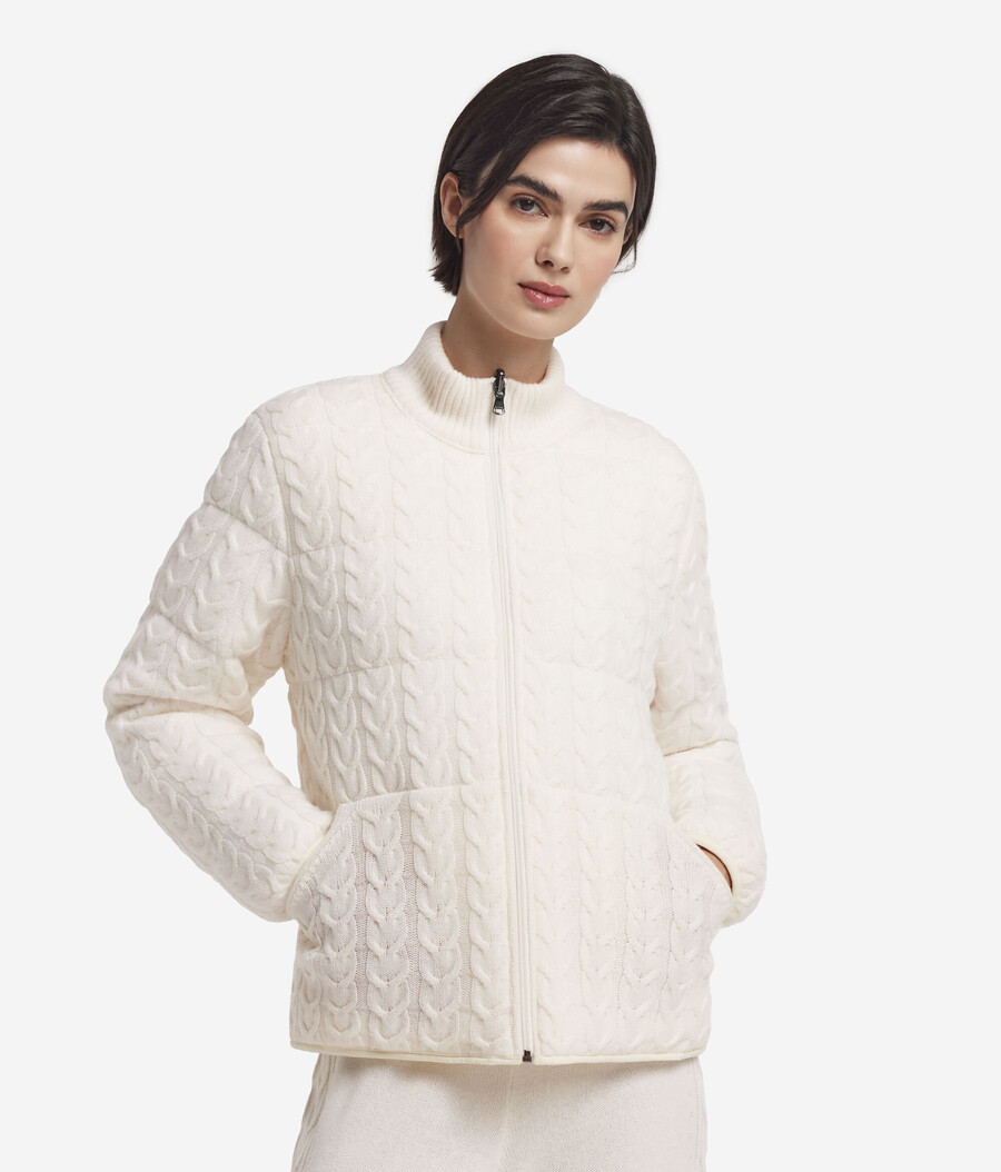 piumino reversibile con lavorazione a trecce in cashmere e tessuto tecnico.