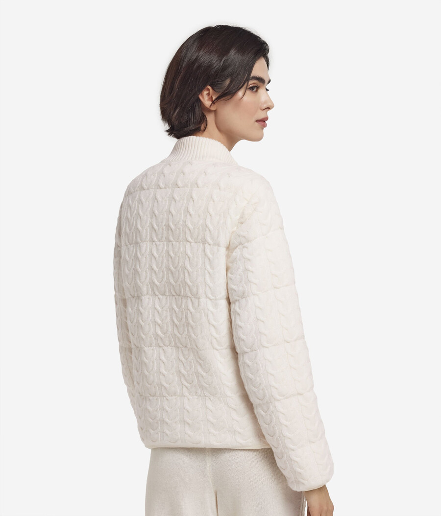 piumino reversibile con lavorazione a trecce in cashmere e tessuto tecnico.