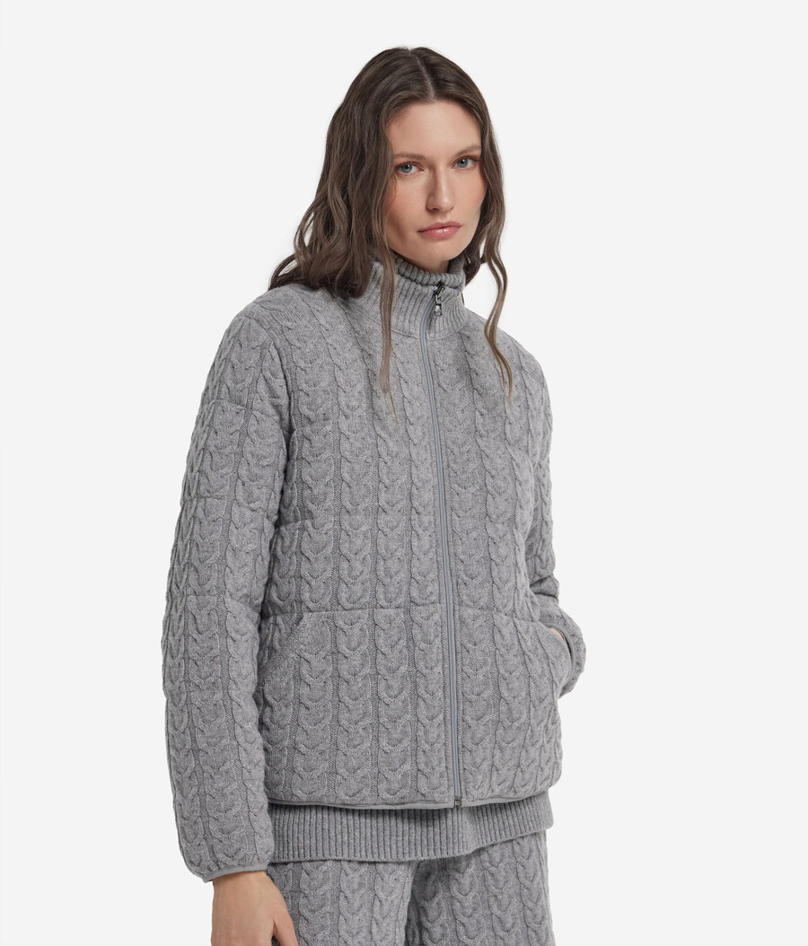 piumino reversibile con lavorazione a trecce in cashmere e tessuto tecnico.