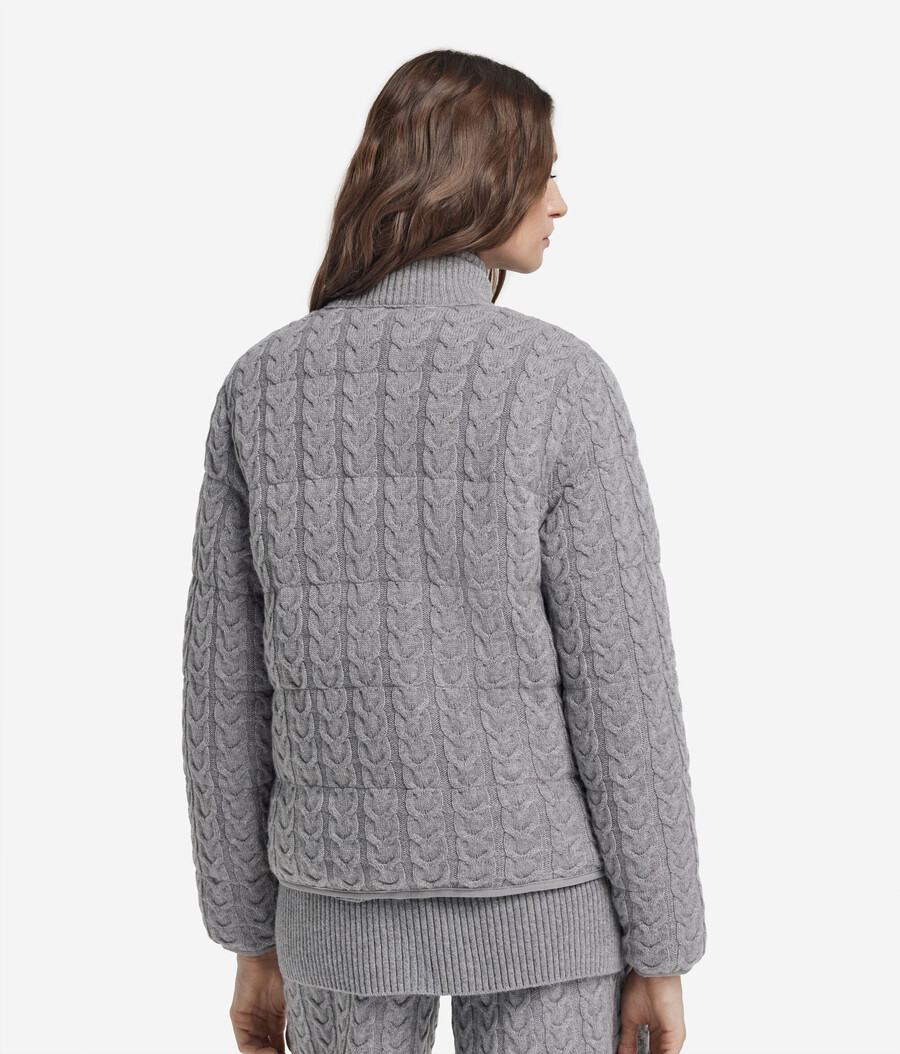 piumino reversibile con lavorazione a trecce in cashmere e tessuto tecnico.