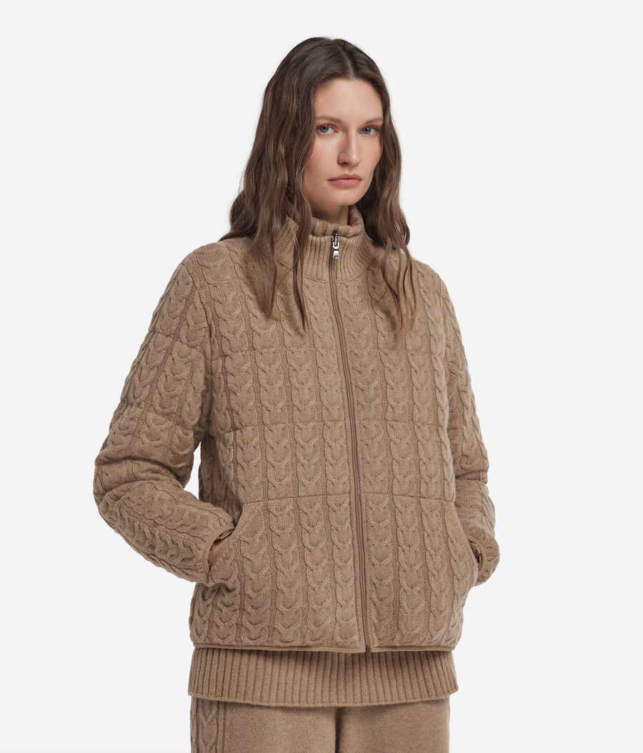 piumino reversibile con lavorazione a trecce in cashmere e tessuto tecnico.